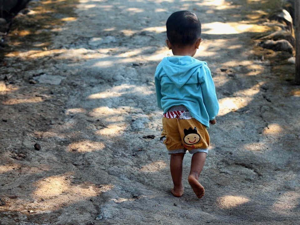 A child walking alone